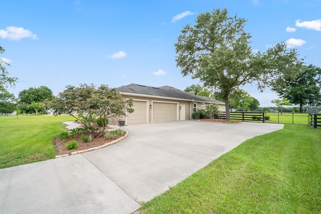 view of property exterior with a lawn and a garage