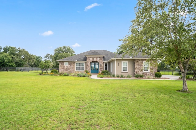 view of front of home with a front lawn