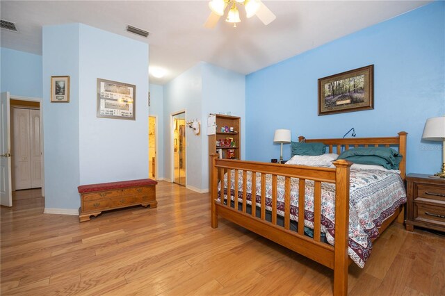 bedroom featuring ceiling fan and light hardwood / wood-style flooring