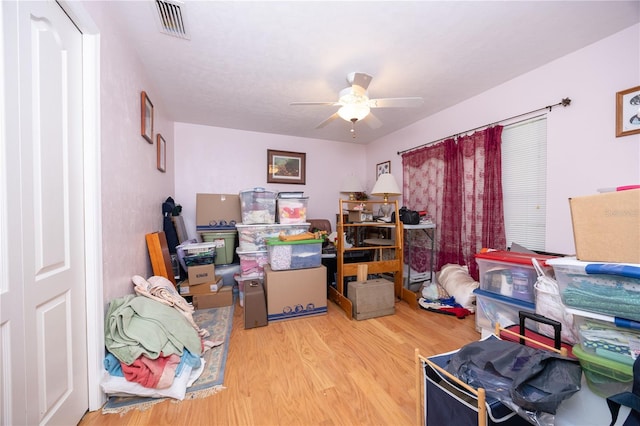 storage area with ceiling fan