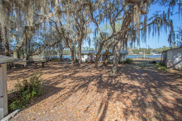 view of yard featuring a water view