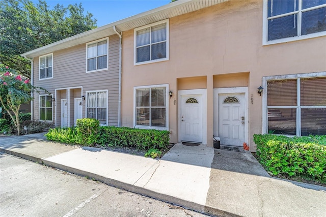 multi unit property featuring stucco siding