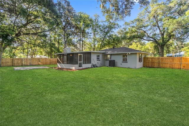 1022 NE 8th Ave, Gainesville, FL 32601 - back of property featuring a sunroom and central AC
