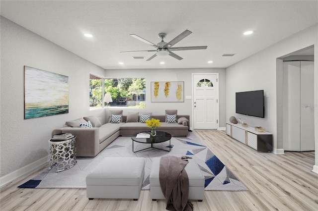1022 NE 8th Ave, Gainesville, FL 32601 - living area with wood finished floors, a ceiling fan, recessed lighting, and baseboards