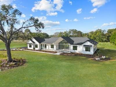 view of front of house with a front lawn