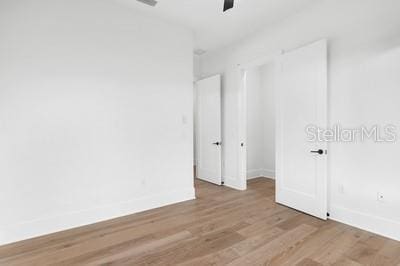 unfurnished room featuring light wood-type flooring