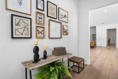 corridor featuring light hardwood / wood-style floors