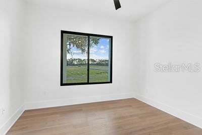 19010 SW 21st Pl, Newberry, FL 32669 - empty room with hardwood / wood-style flooring and ceiling fan