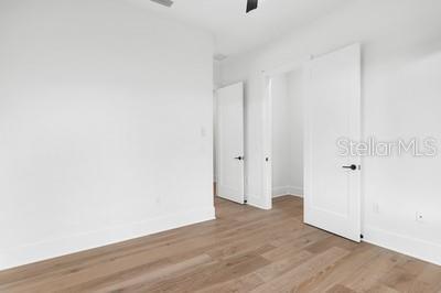 19010 SW 21st Pl, Newberry, FL 32669 - spare room featuring light wood-type flooring