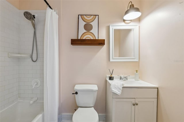 full bathroom with vanity, shower / bath combination with curtain, and toilet