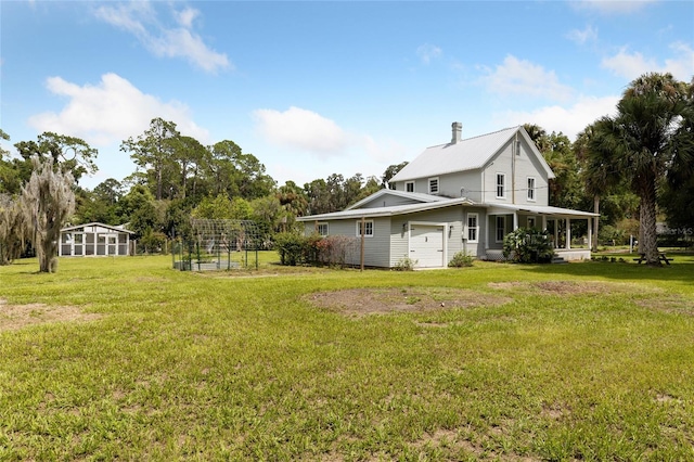 view of yard with a garage