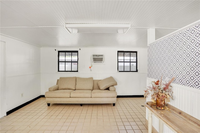 tiled living room featuring a wall mounted air conditioner