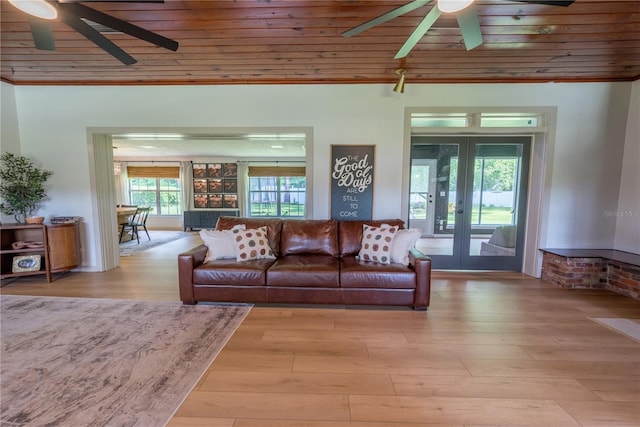 living room with wooden ceiling, french doors, ceiling fan, and light wood-type flooring