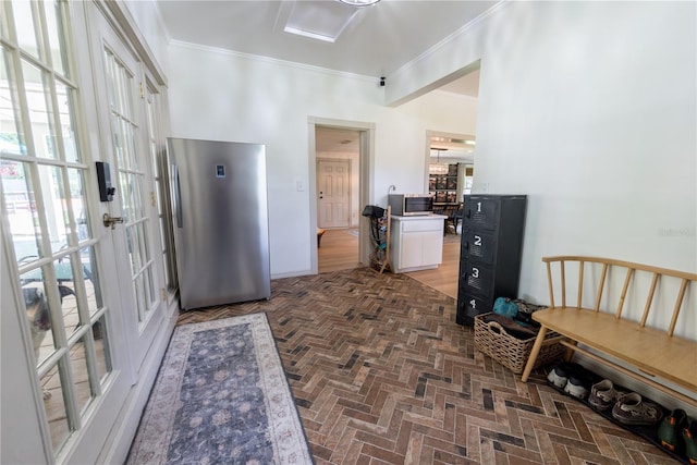 hall featuring french doors and ornamental molding