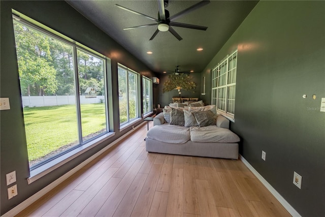 sunroom with ceiling fan