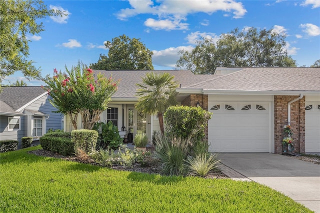 ranch-style house with a front yard and a garage