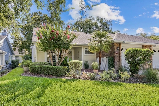 view of front facade featuring a front yard