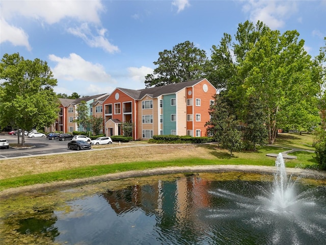 view of property's community featuring a water view