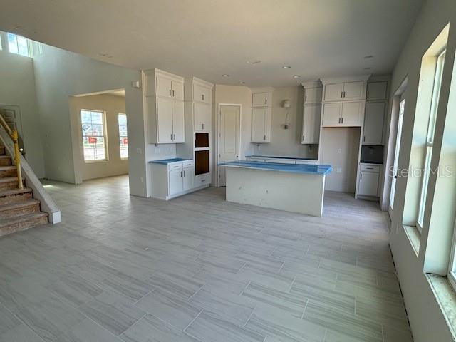 kitchen featuring white cabinetry and a center island