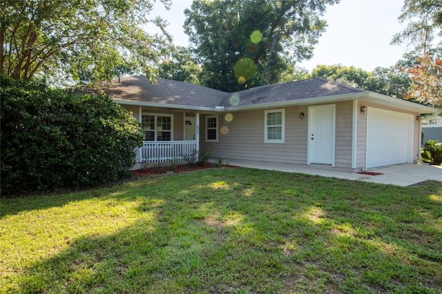 single story home with a garage, covered porch, and a front lawn