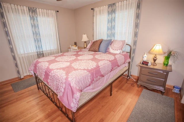 bedroom with light hardwood / wood-style flooring