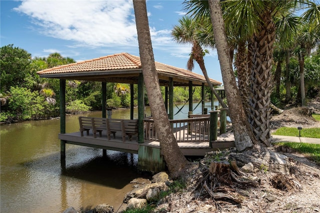 dock area featuring a gazebo and a water view