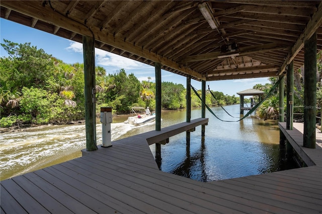 view of dock with a water view