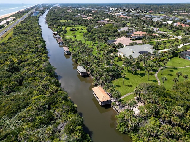 drone / aerial view with a water view