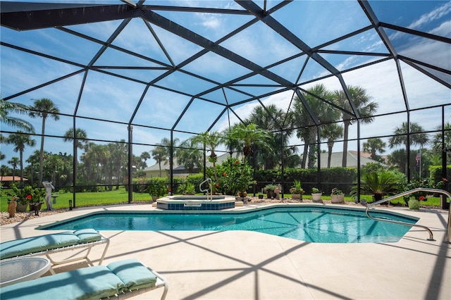 view of pool featuring a lanai, a patio, and an in ground hot tub