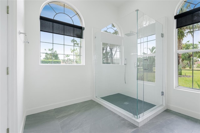 interior space with plenty of natural light and baseboards