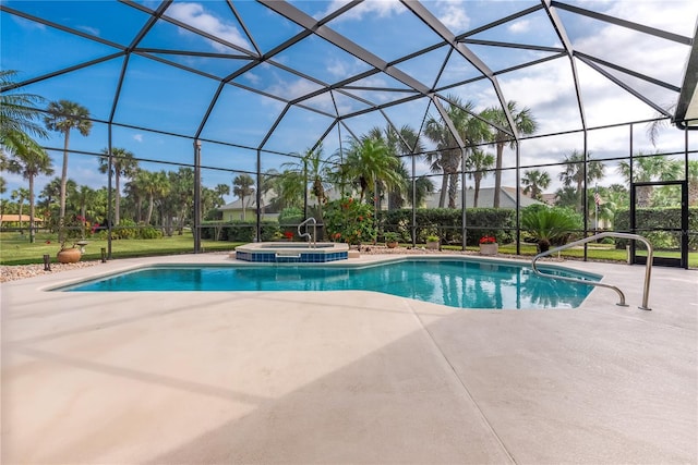 view of swimming pool with glass enclosure, a patio area, and a pool with connected hot tub