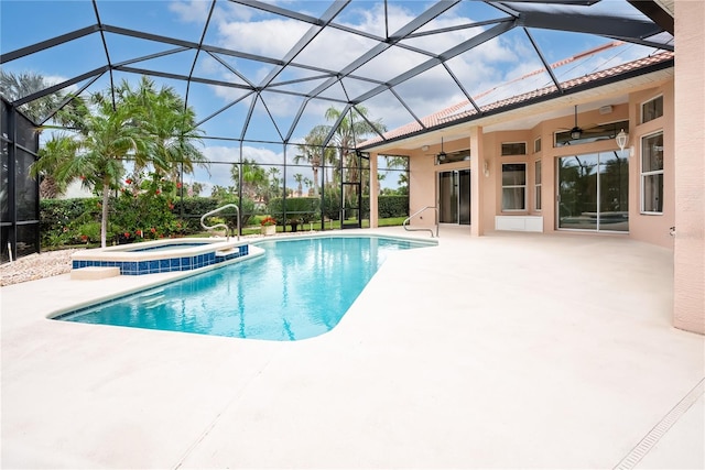 view of swimming pool with a lanai, a pool with connected hot tub, a ceiling fan, and a patio