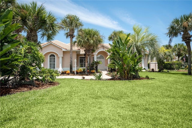 view of front facade with a front yard