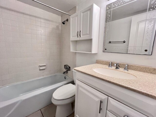 full bathroom featuring  shower combination, vanity, and toilet