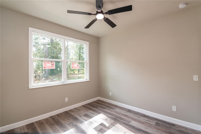 unfurnished room featuring ceiling fan and light wood-type flooring