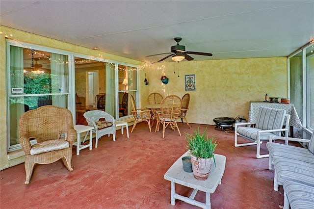 view of patio featuring ceiling fan