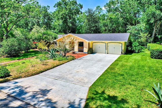 ranch-style home featuring a garage and a front lawn