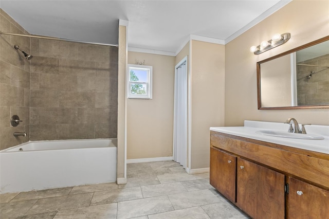 bathroom featuring tiled shower / bath combo, ornamental molding, and vanity