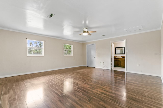 unfurnished room with ornamental molding, ceiling fan, and dark hardwood / wood-style floors