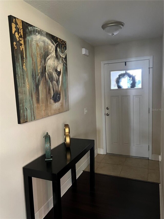 entrance foyer featuring hardwood / wood-style flooring