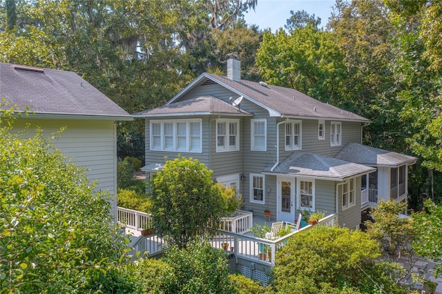 view of front of property featuring a deck and a sunroom