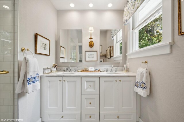 bathroom featuring dual bowl vanity