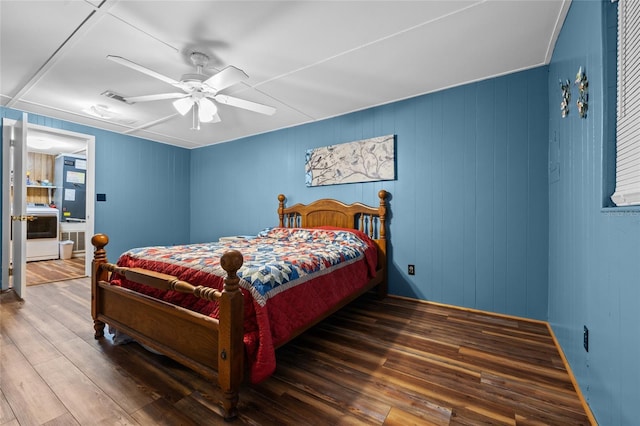 bedroom featuring ceiling fan and wood finished floors