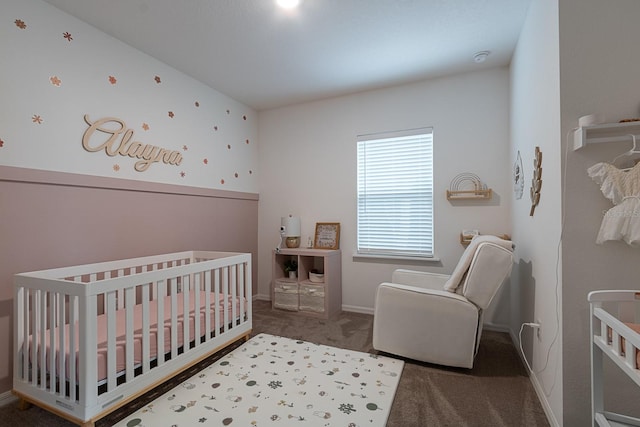 carpeted bedroom featuring a crib