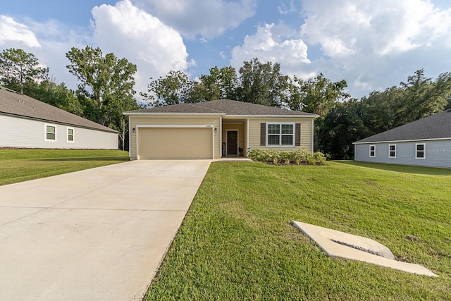 view of front facade featuring a garage and a front yard