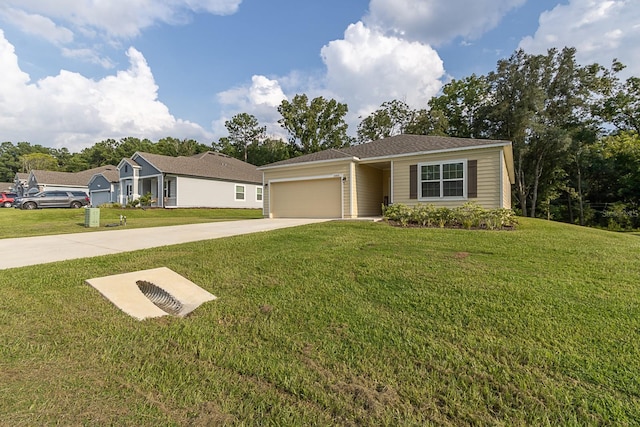 view of front facade featuring a front yard and a garage