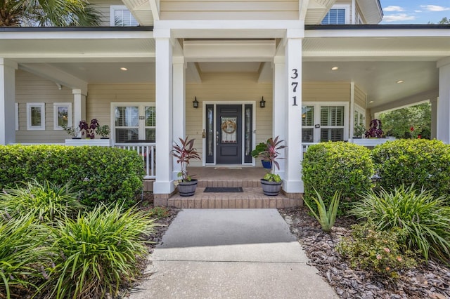 doorway to property with covered porch