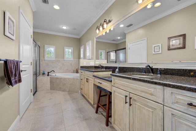 bathroom with tile patterned flooring, double sink vanity, shower with separate bathtub, and ornamental molding