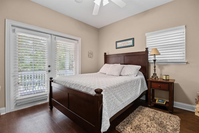 bedroom featuring dark hardwood / wood-style flooring, access to outside, and ceiling fan