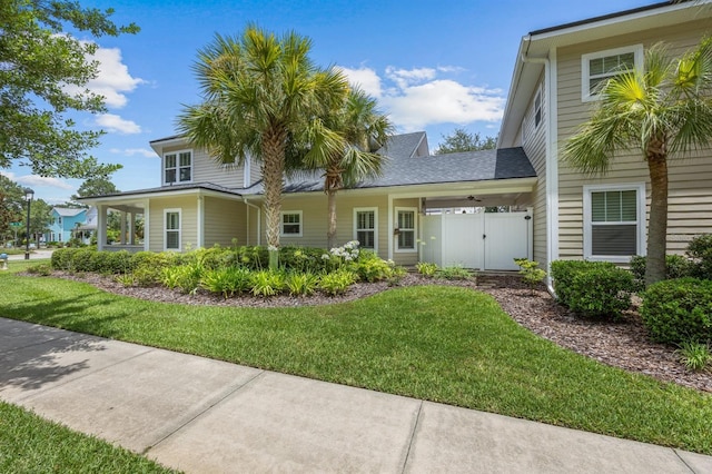 view of front of home with a front yard